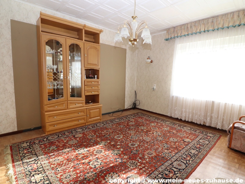 Bild 8 Wohnzimmer Einfamilienhaus Gro�r�schen